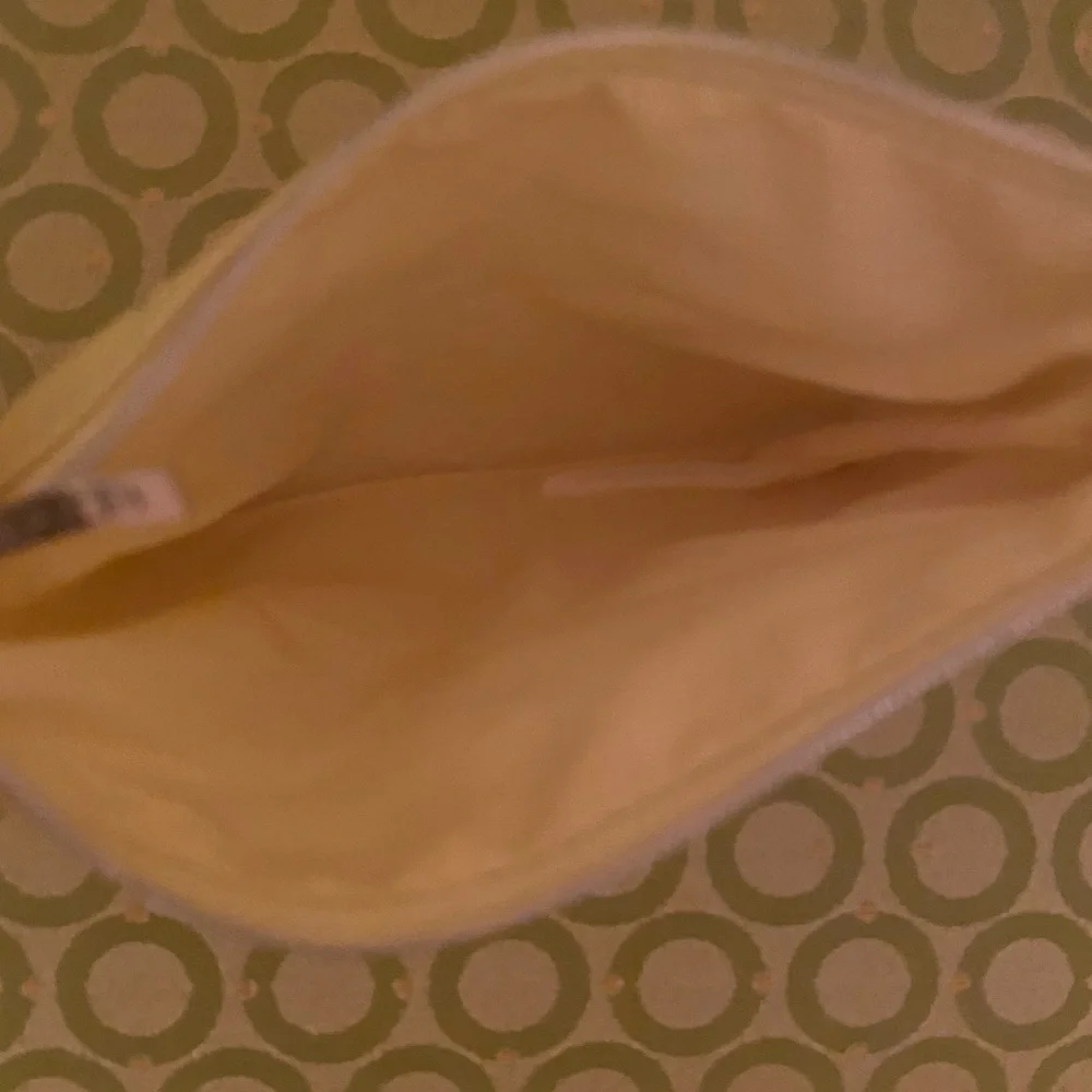 L’Occitane yellow soft cosmetic bag